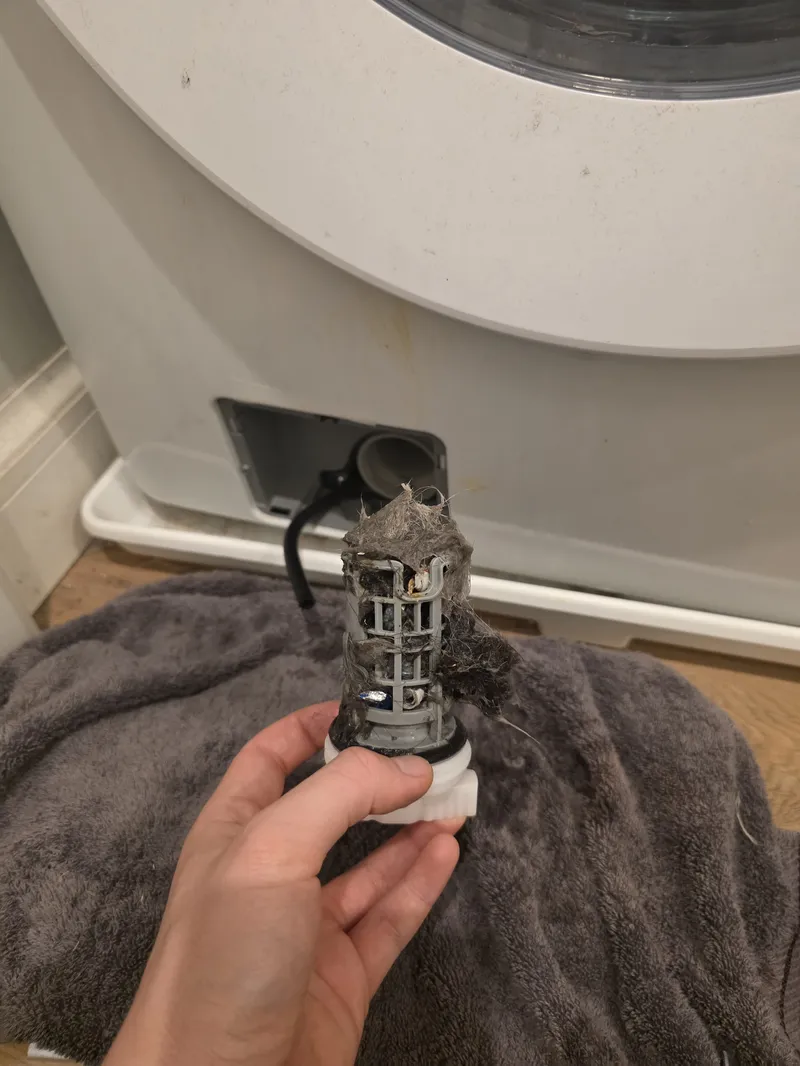 Clogged washer drain filter repair