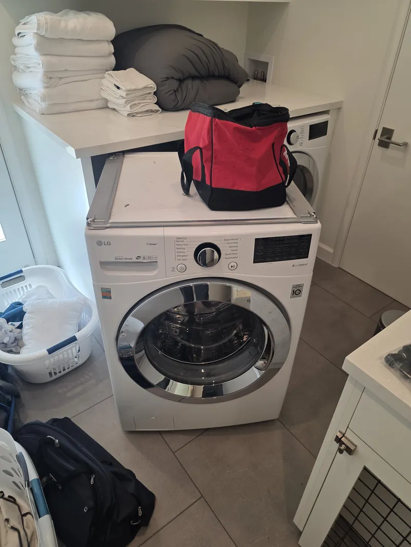 LG front-load washer in a Marin County laundry room during a UniFix service call