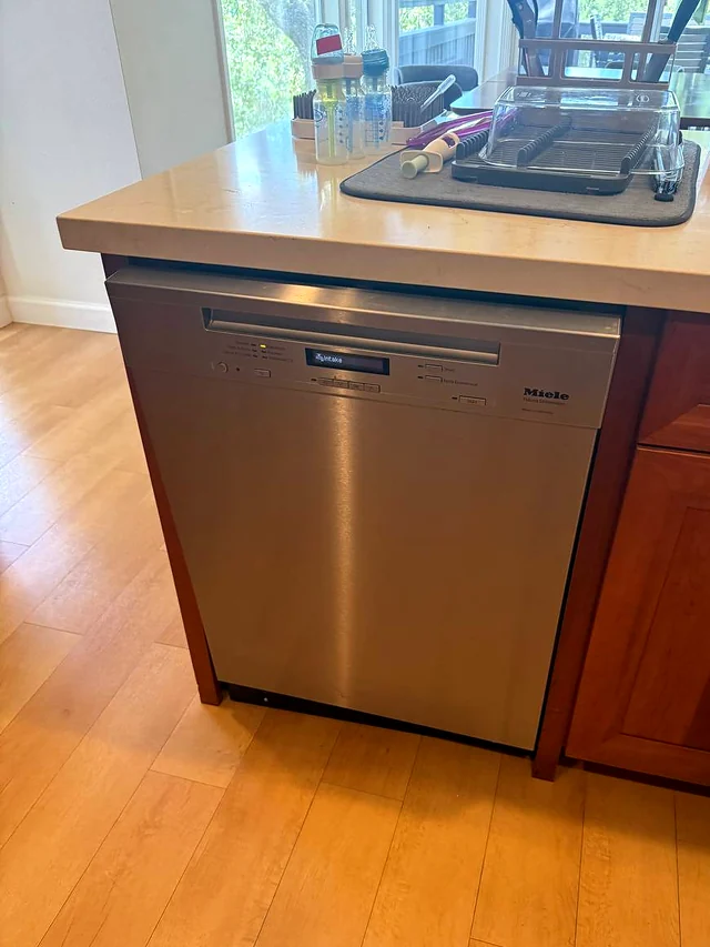 Miele stainless dishwasher in a kitchen island